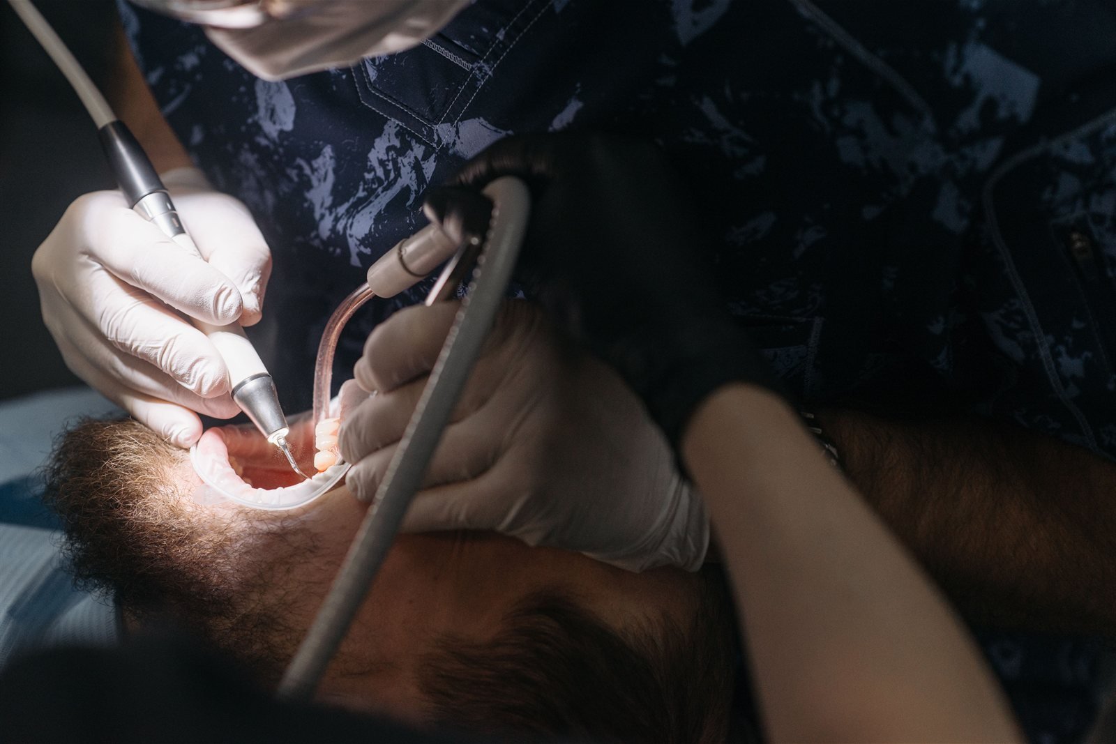 Periodontist performing functional crown lengthening surgery in Los Angeles